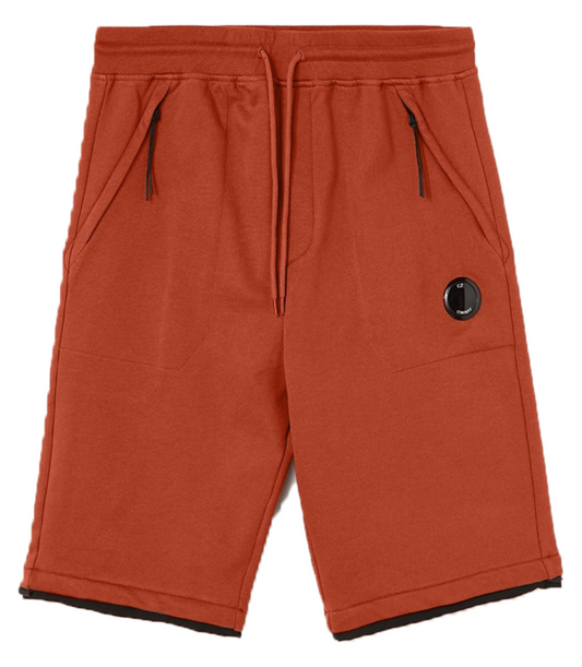 CP COMPANY RAISED FLEECE LENS SHORTS IN BURNT OCHRE